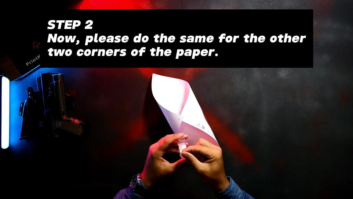 Step 2 - Now, please do the same for the other two corners of the paper.
