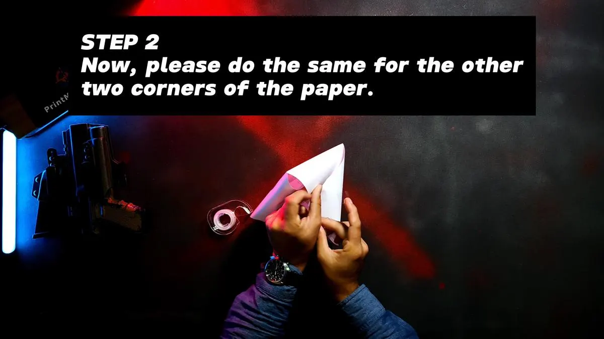 Step 2 - Now, please do the same for the other two corners of the paper.
