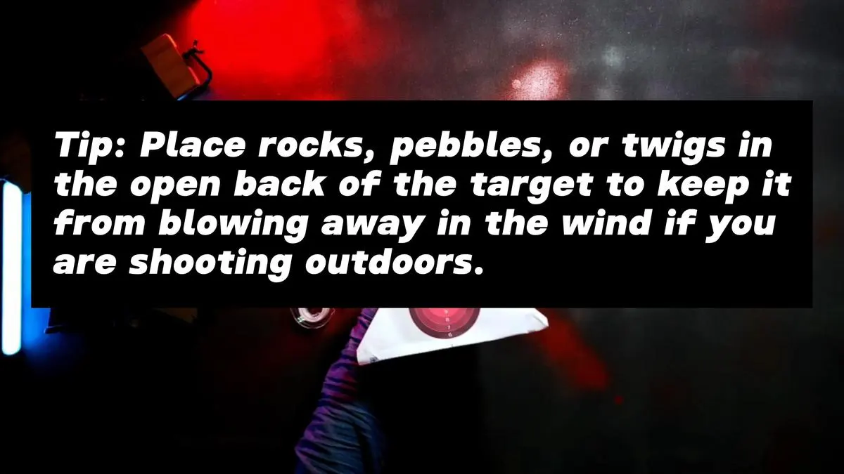 Tip: Place rocks, pebbles, or twigs in the open back of the target to keep it from blowing away in the wind if you are shooting outdoors.