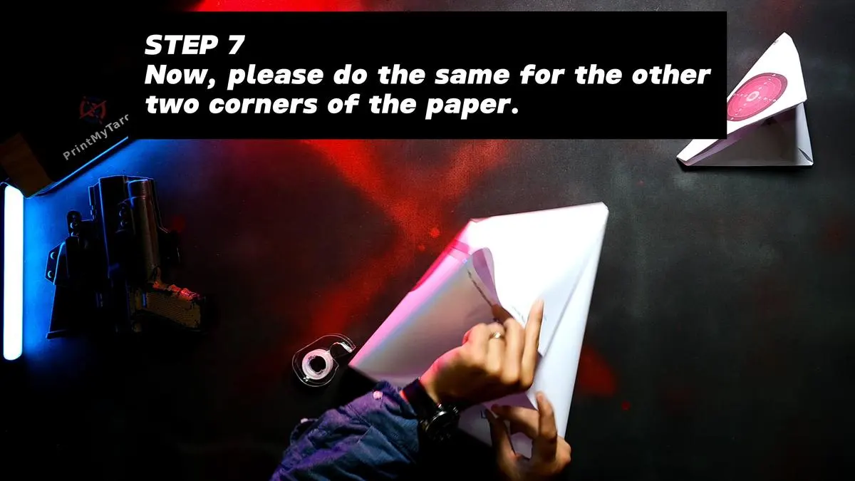 Step 7 - Now, please do the same for the other two corners of the paper. 